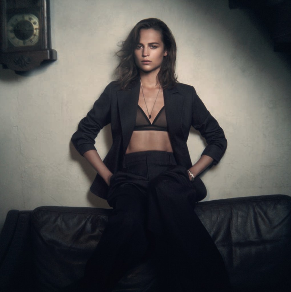 Alicia Vikander, Jacket and trousers, both Dior; bra, Eres; pendant, Salvatore Ferragamo; bracelet, Aurélie Bidermann